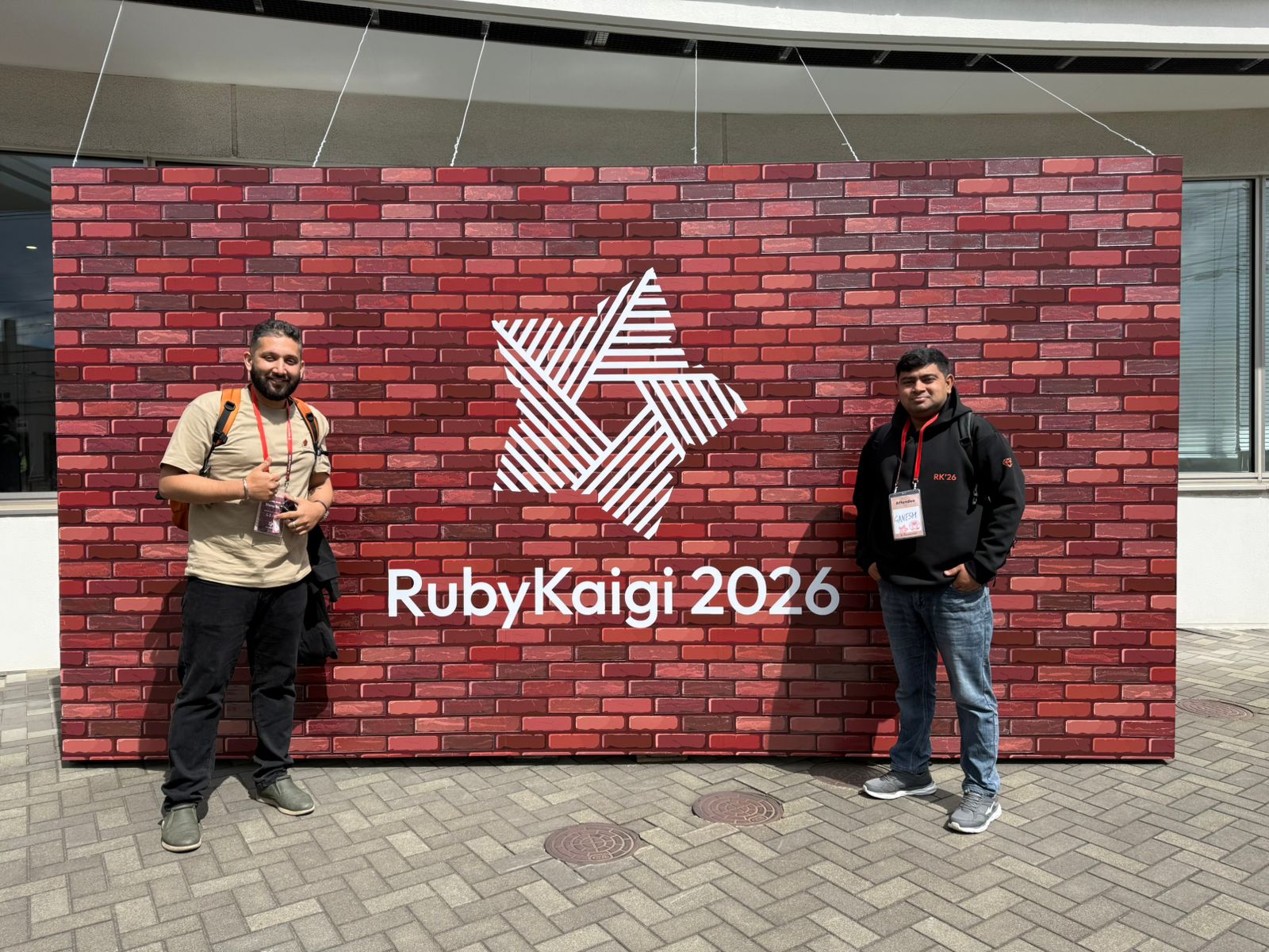 Infront of Kaigi Banner